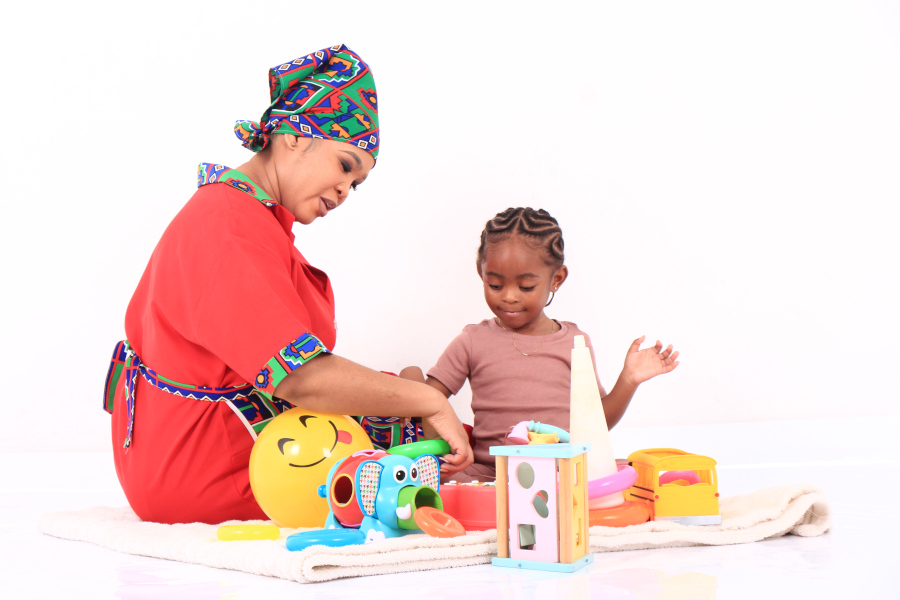 Caring nanny with toddler